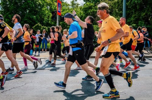 Runners participate in the lively Poznań Marathon in Poland.