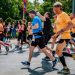 Runners participate in the lively Poznań Marathon in Poland.